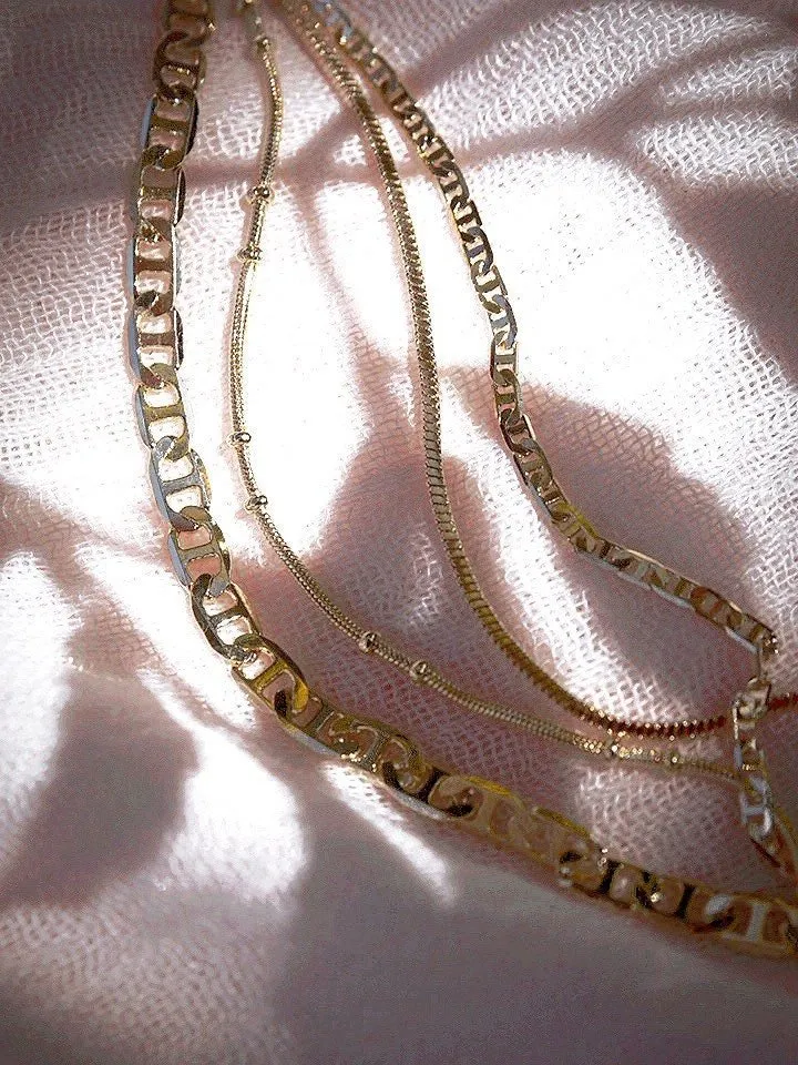 Four Gold Chain Necklace Set