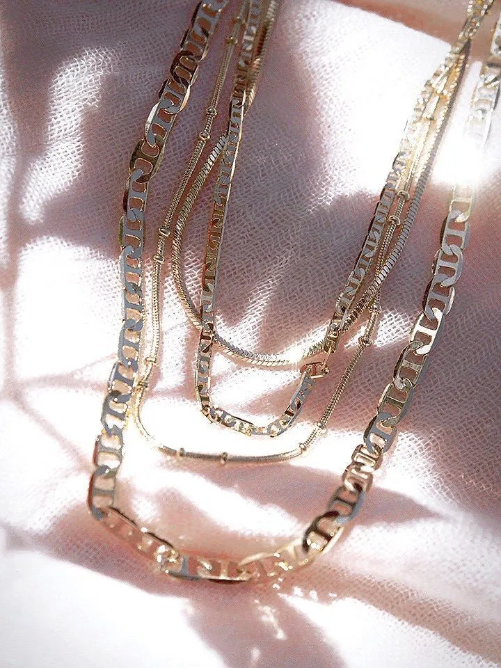 Four Gold Chain Necklace Set